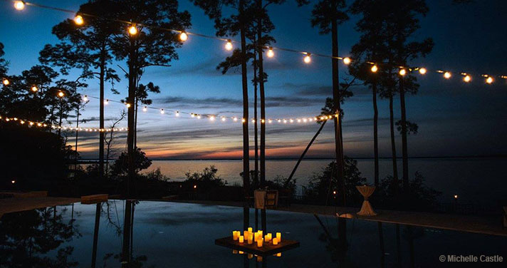 Pool by the sea at night